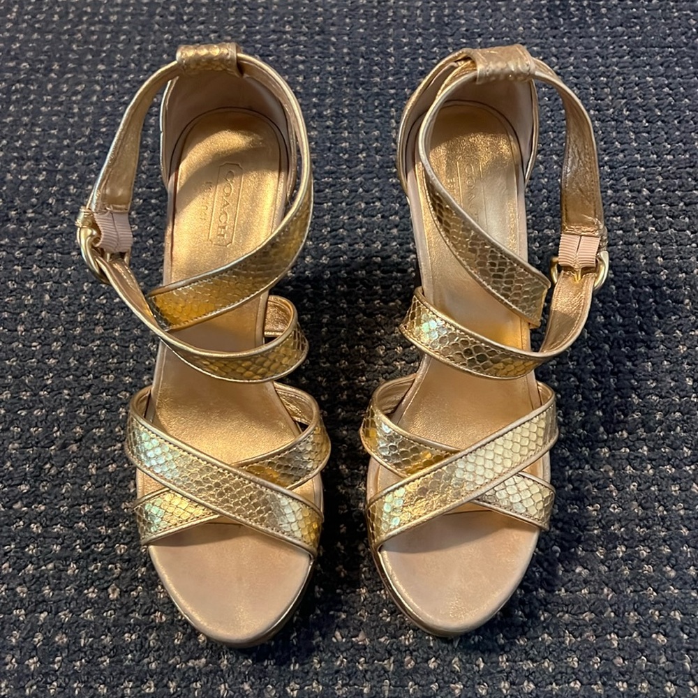 Coach Metallic gold embossed wedges Size 7 worn but decent condition